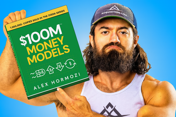 Alex Hormozi, wearing a white tank top and a baseball cap, holds and points to his green book "$100M Money Models."